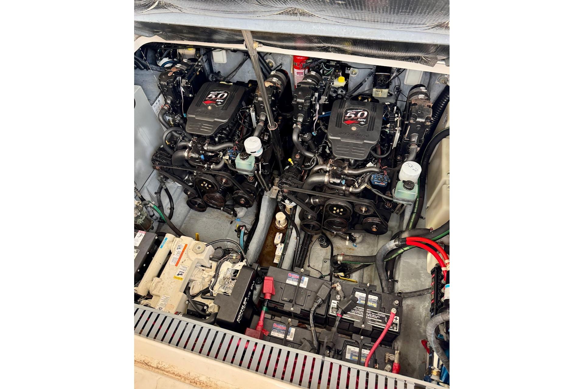 Engine compartment of a 2003 Sea Ray 300 Sundancer with dual 5.0L engines.