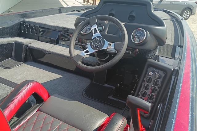 2026 Phoenix 721 ZXL boat interior with steering wheel and dashboard controls.