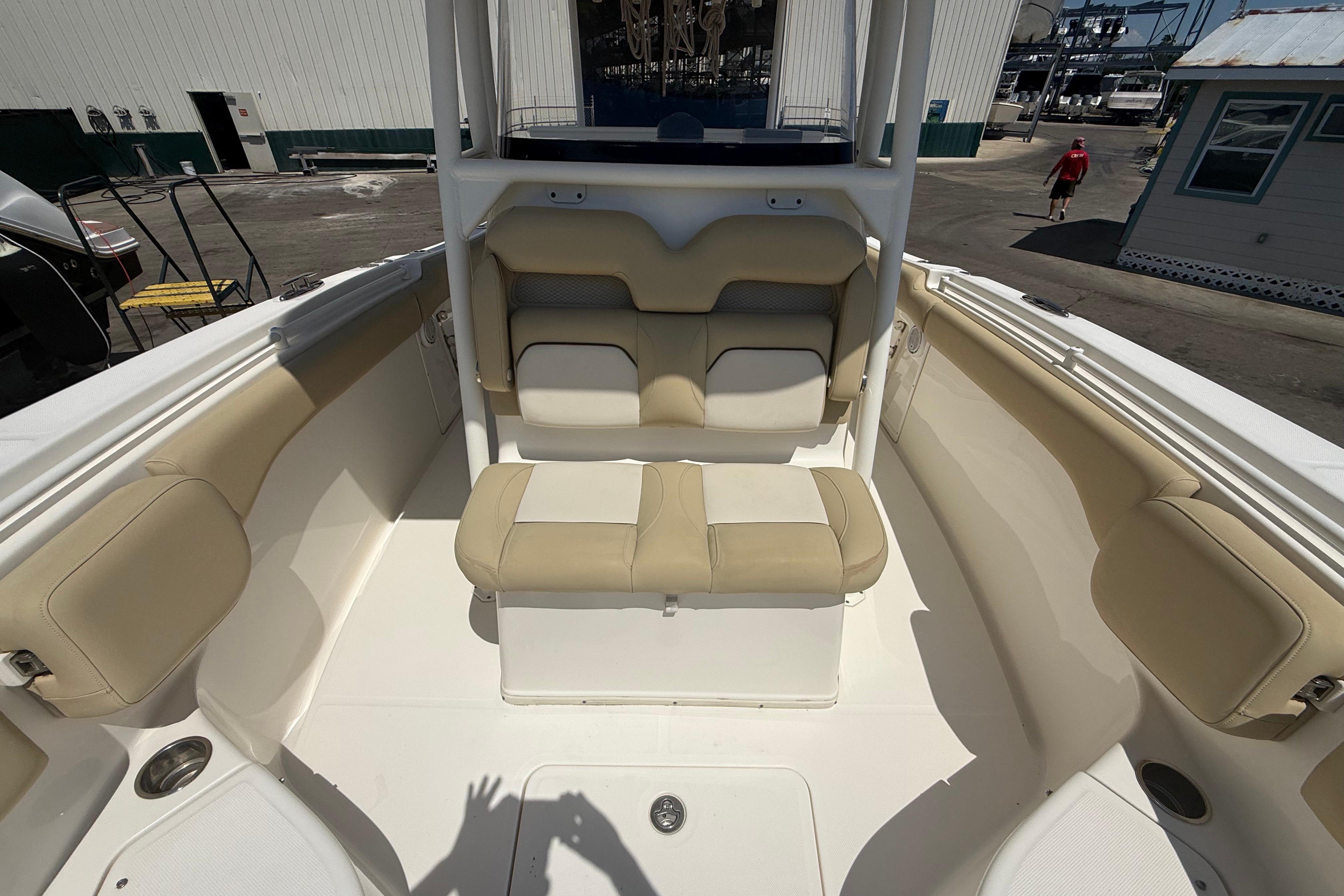 2019 Key West Billistic 281 Center Console boat interior with beige seating.