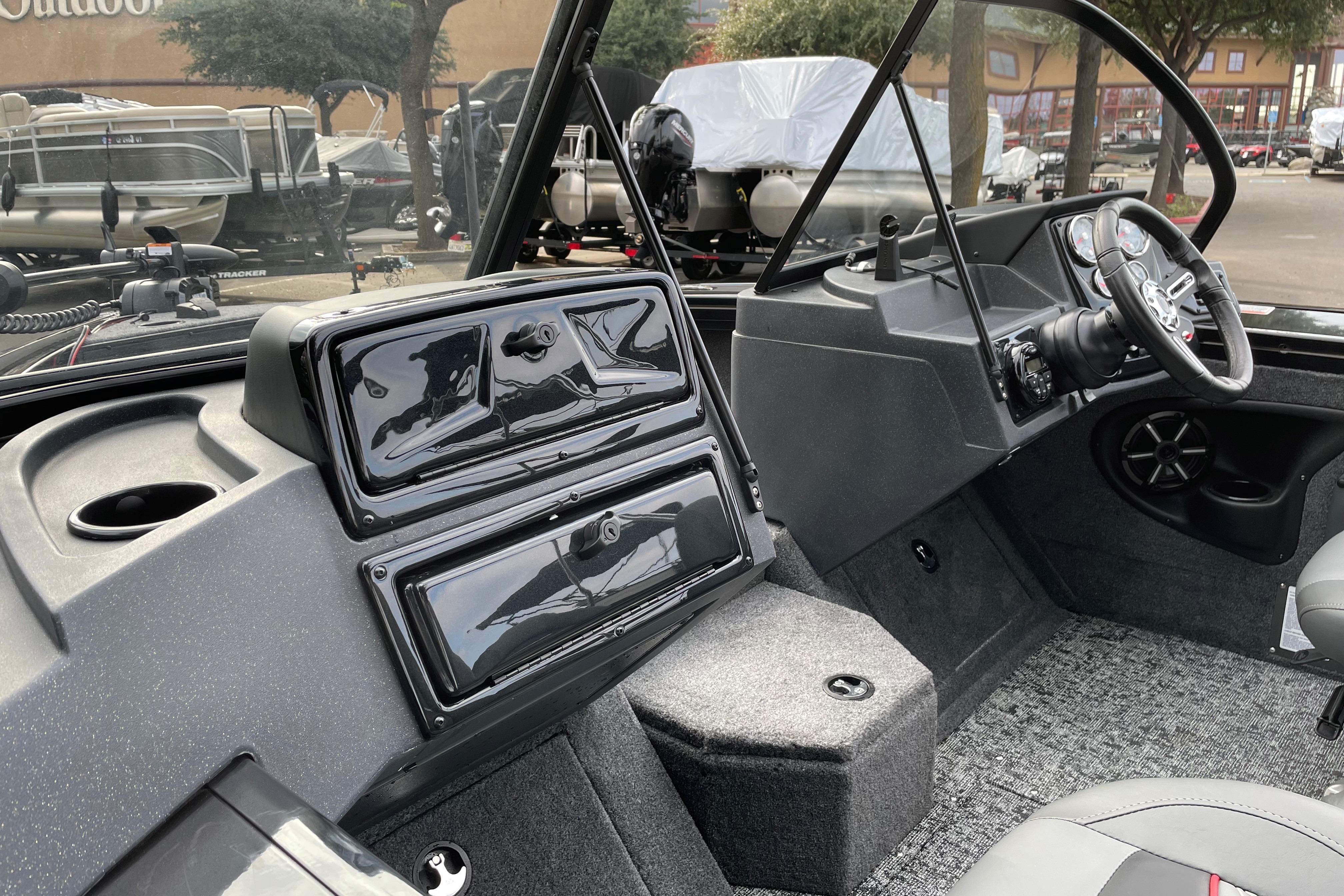 2026 Tracker Targa V-19 WT boat interior with steering wheel and dashboard controls.