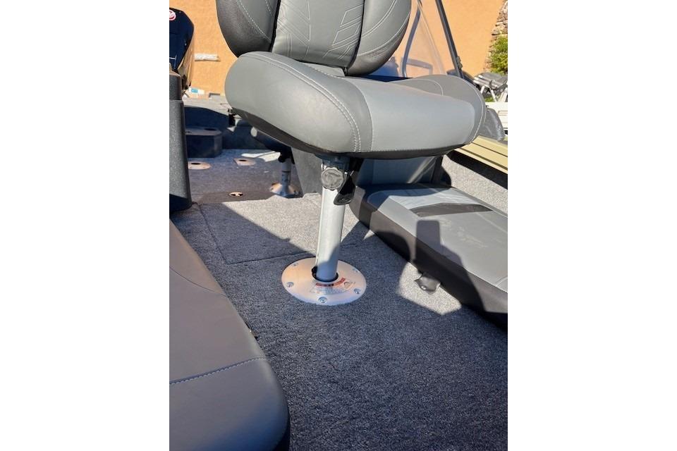2026 Tracker Targa V-18 Combo boat seat with gray upholstery and sturdy base.