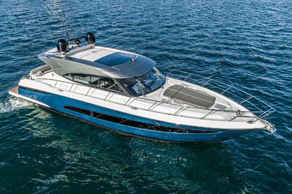 2021 Riviera 5400 Sport Yacht cruising on open water.