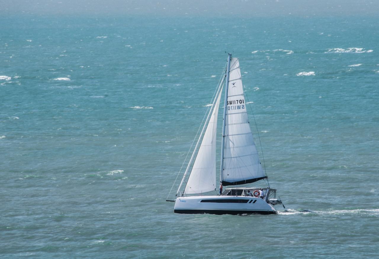 2025 Seawind 1170 sailing on open ocean waters.