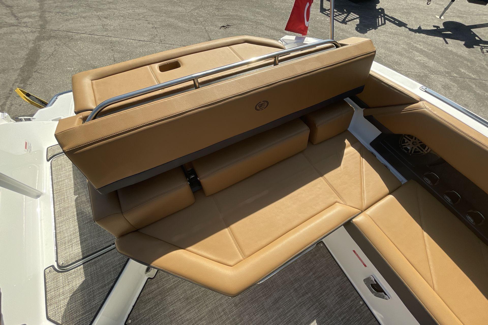 2025 Cobalt R4 boat interior with tan leather seating and modern design.