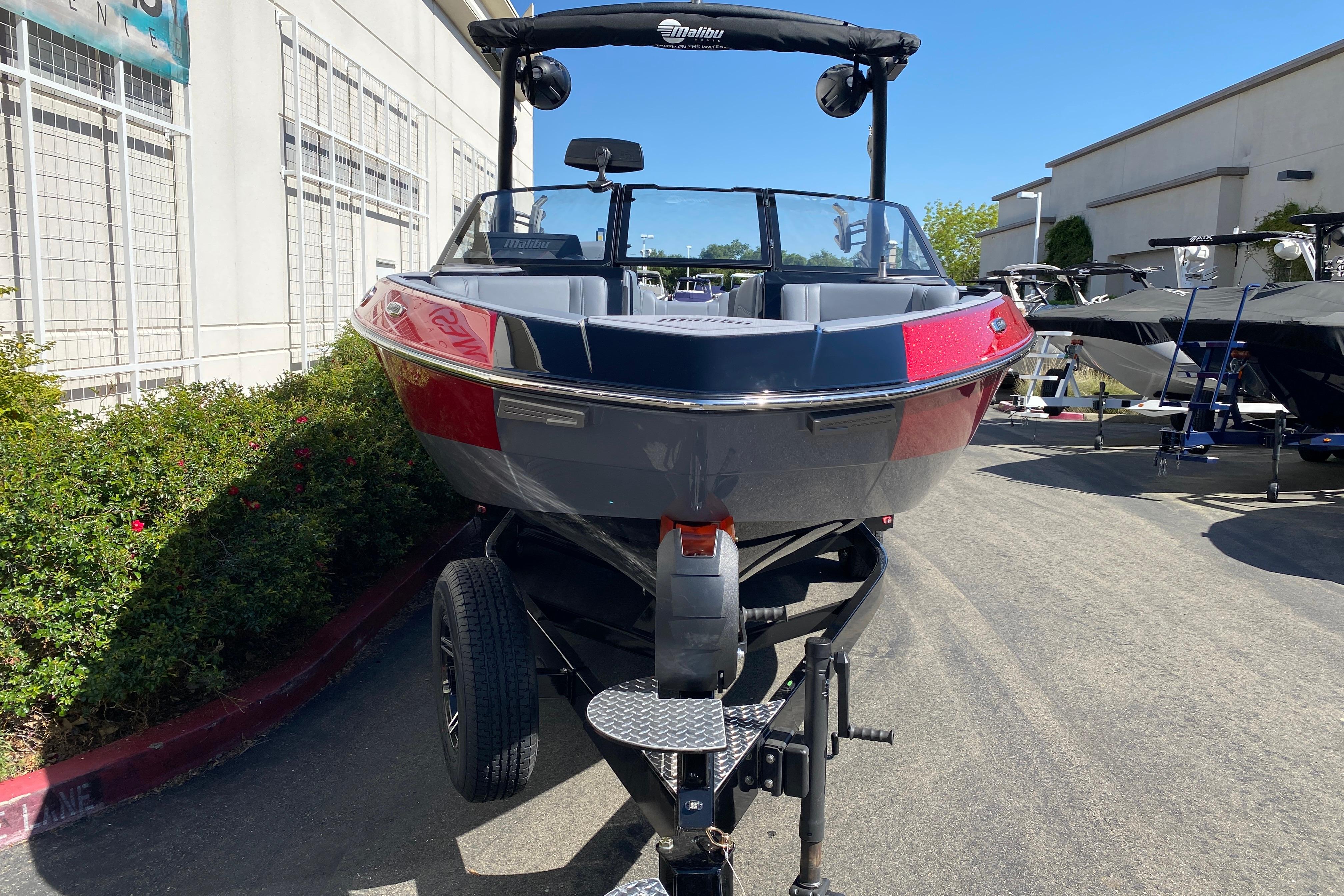 2025 Malibu Wakesetter 23 LSV boat on trailer, displayed outdoors.