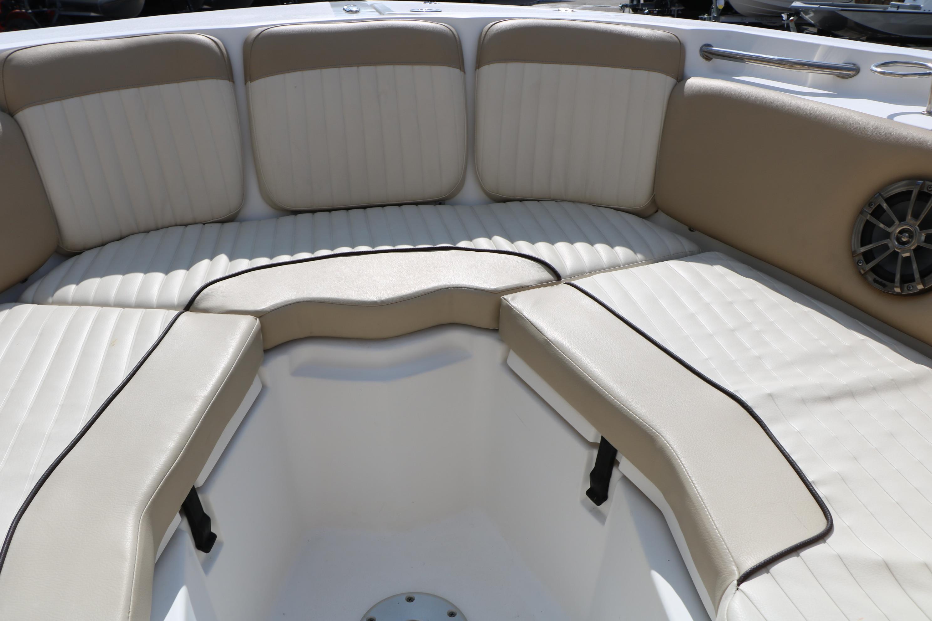 2017 Sea Fox 226 Traveler boat interior with beige cushioned seating.