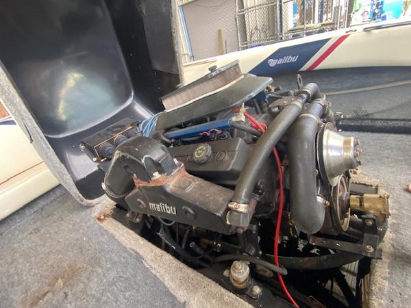 1998 Malibu Response boat engine, detailed view with visible components and branding.