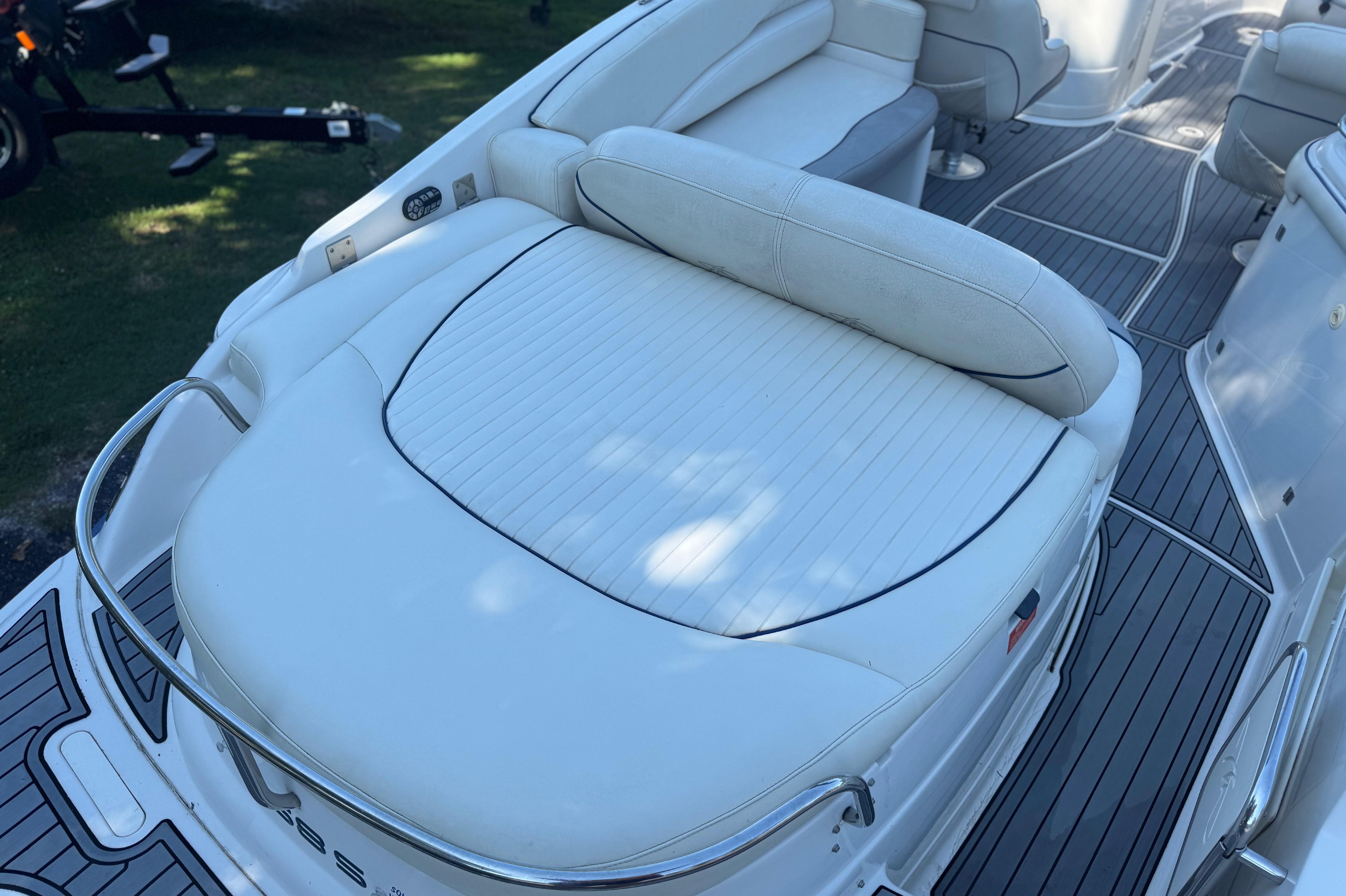Luxury seating on a Monterey 268SS Super Sport boat with sleek white upholstery.