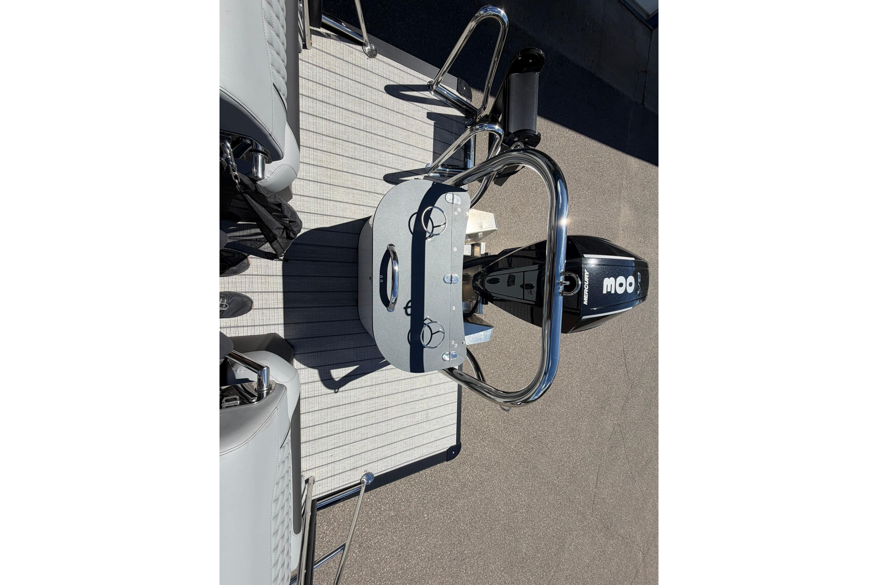 2026 Avalon Catalina Quad Lounge Shift boat with Mercury outboard motor, rear deck view.