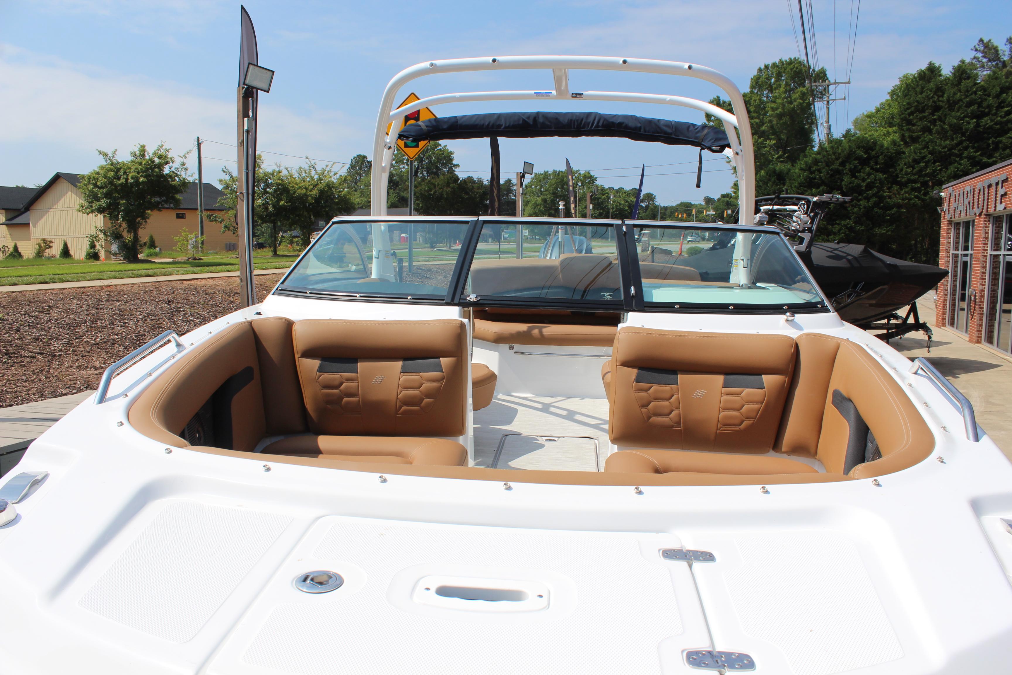 2025 Four Winns HD3 OB boat with tan seating and sleek design.