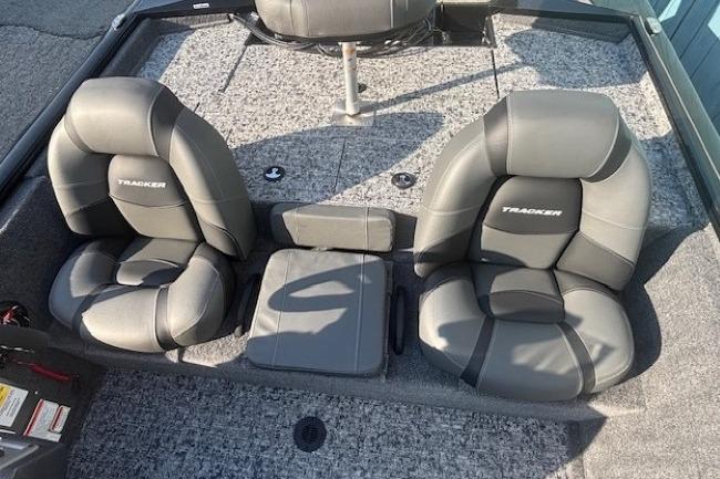 2026 Tracker Pro Team 195 boat seats, gray upholstery, spacious layout.