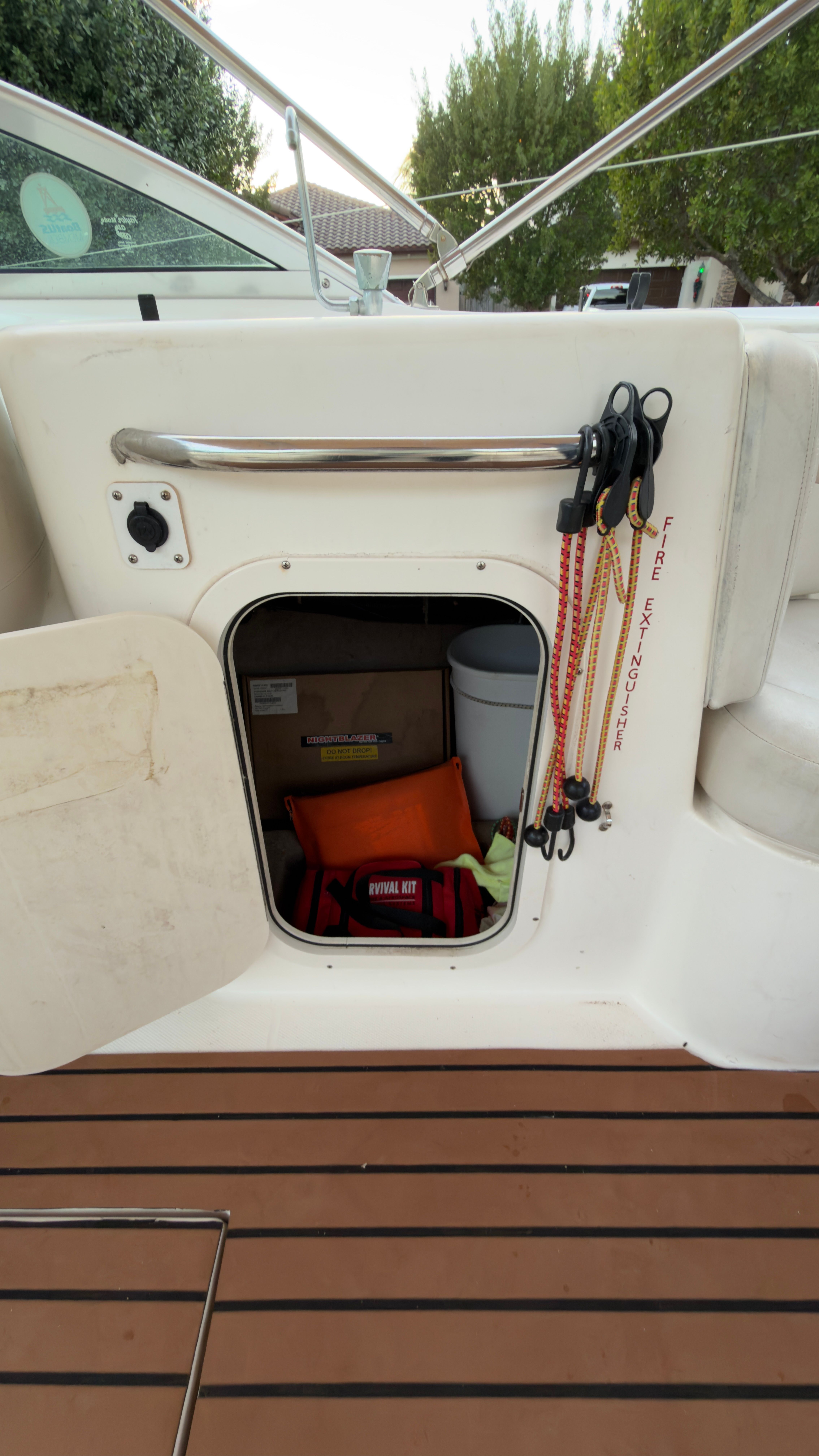 Storage compartment in 2003 Chaparral 263 Sunesta Deckboat.