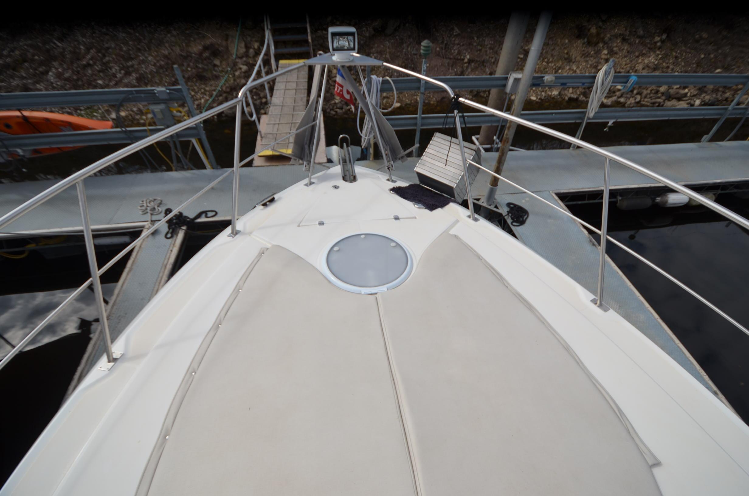 Deck of 2007 Cruisers Yachts 415 Express Motoryacht in harbor.