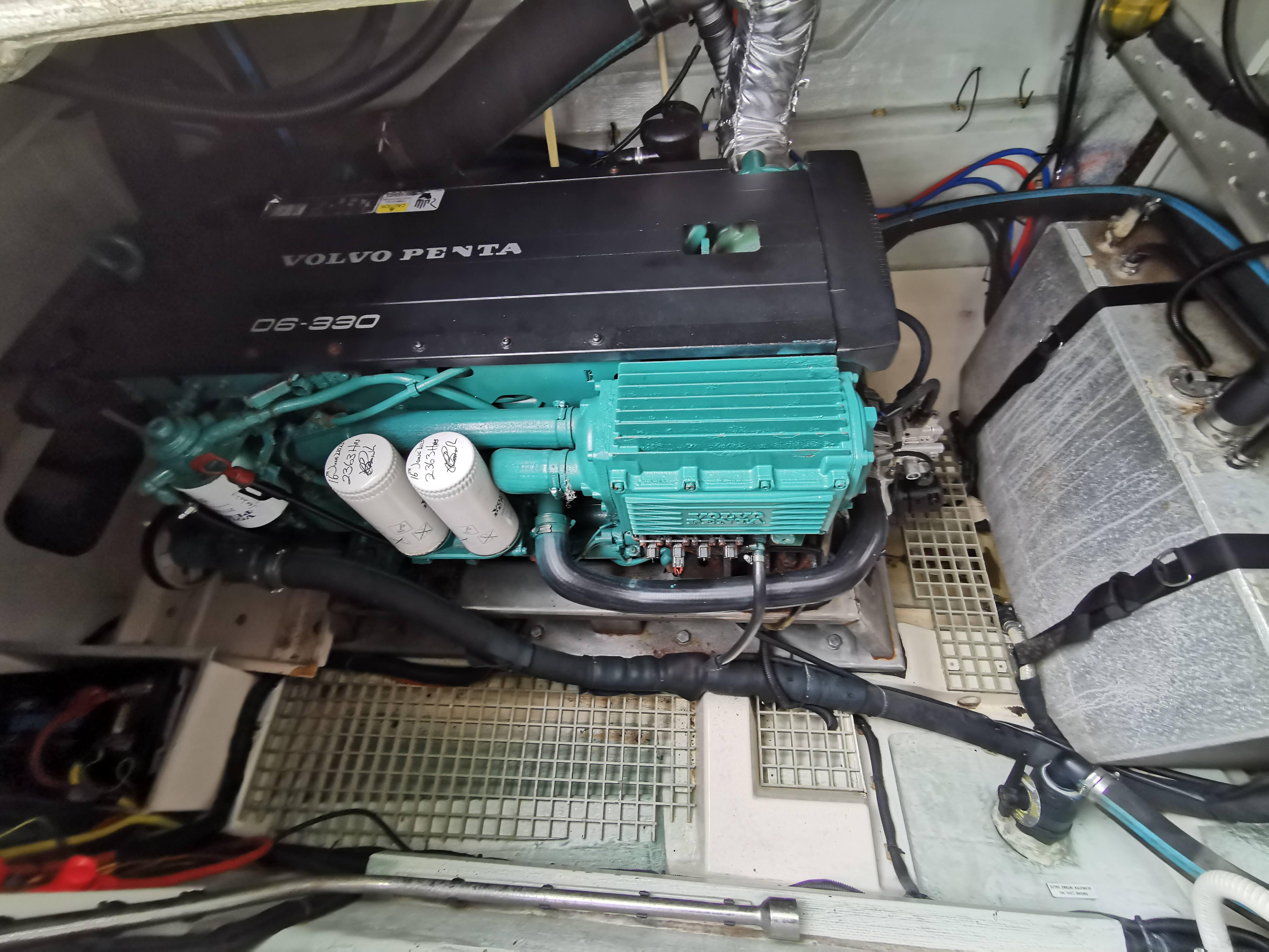 Volvo Penta engine in 2016 Aquila 48 yacht, showcasing mechanical components and layout.