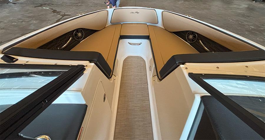 2025 Sea Ray SPX 190 Outboard boat interior with tan seating and modern design.