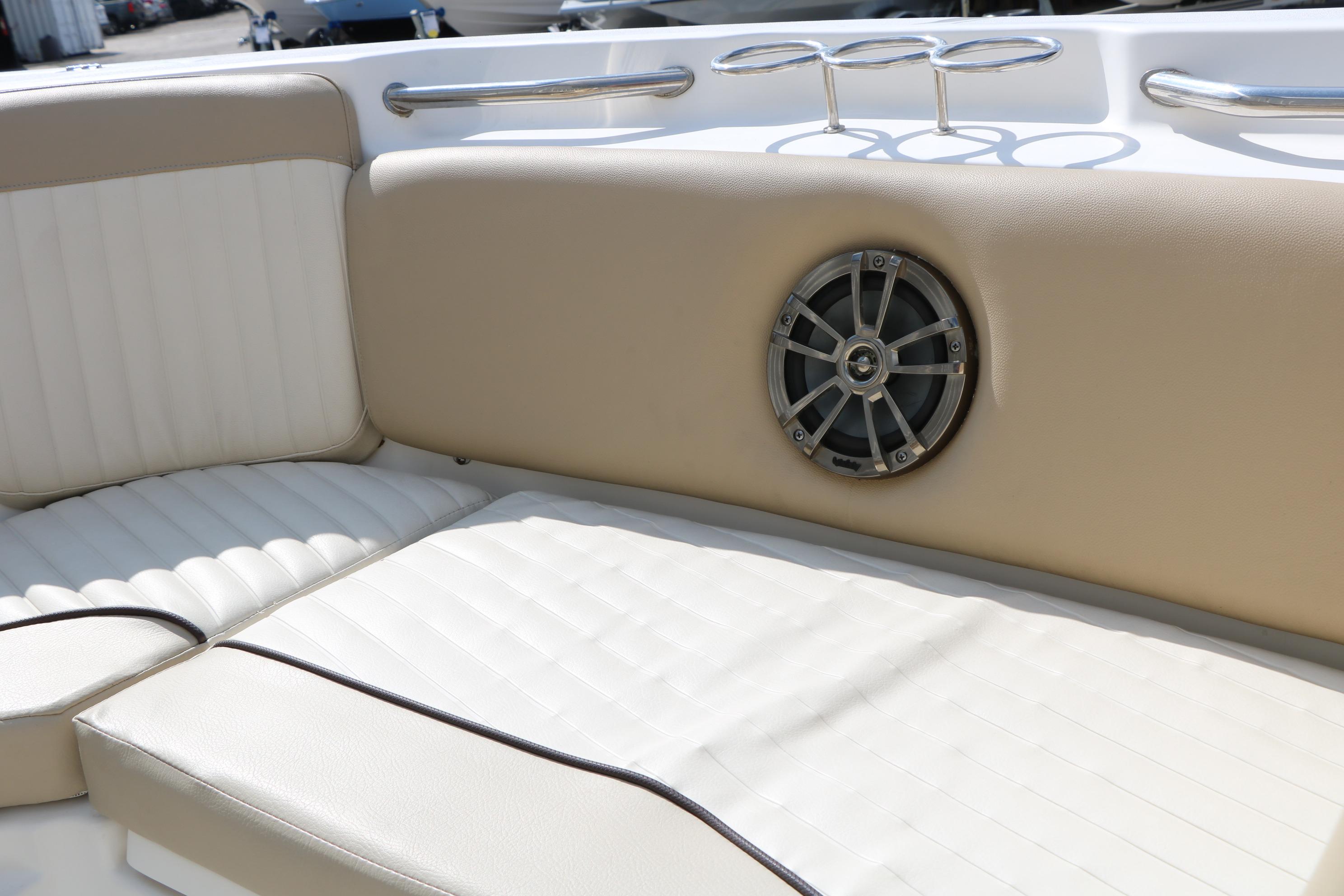 2017 Sea Fox 226 Traveler boat interior with cushioned seating and speaker.