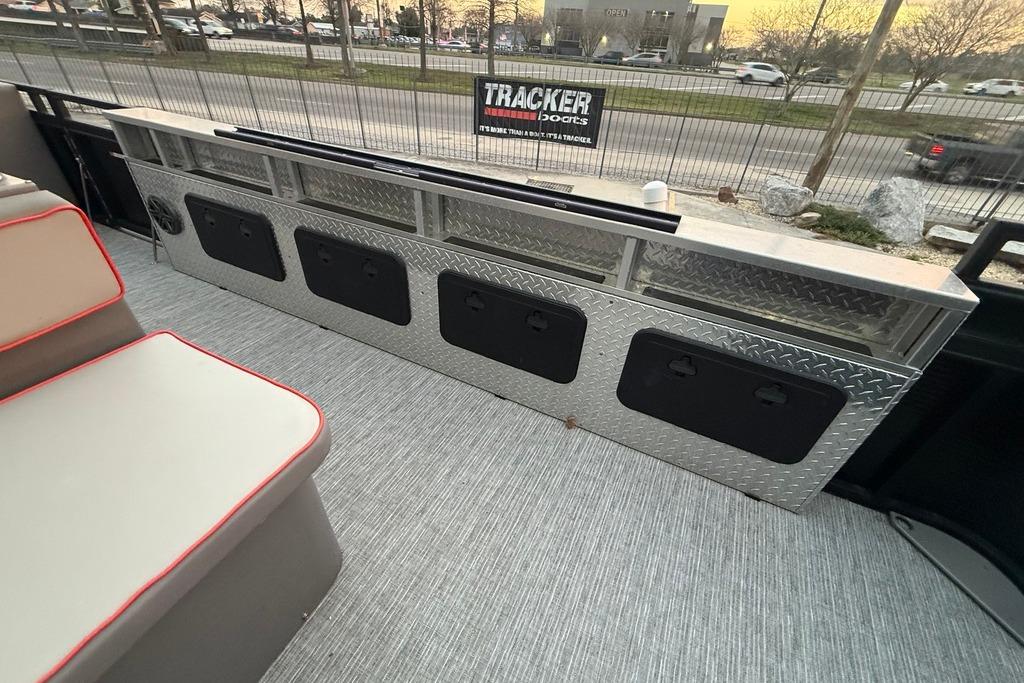 2022 Apex Marine 8524 Pro Fish N Cruise interior with storage compartments and seating.