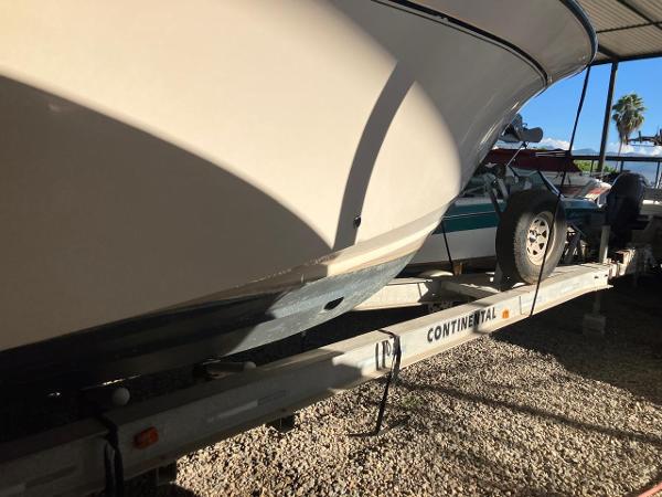 2006 Grady-White Bimini 306 boat on Continental trailer in storage.