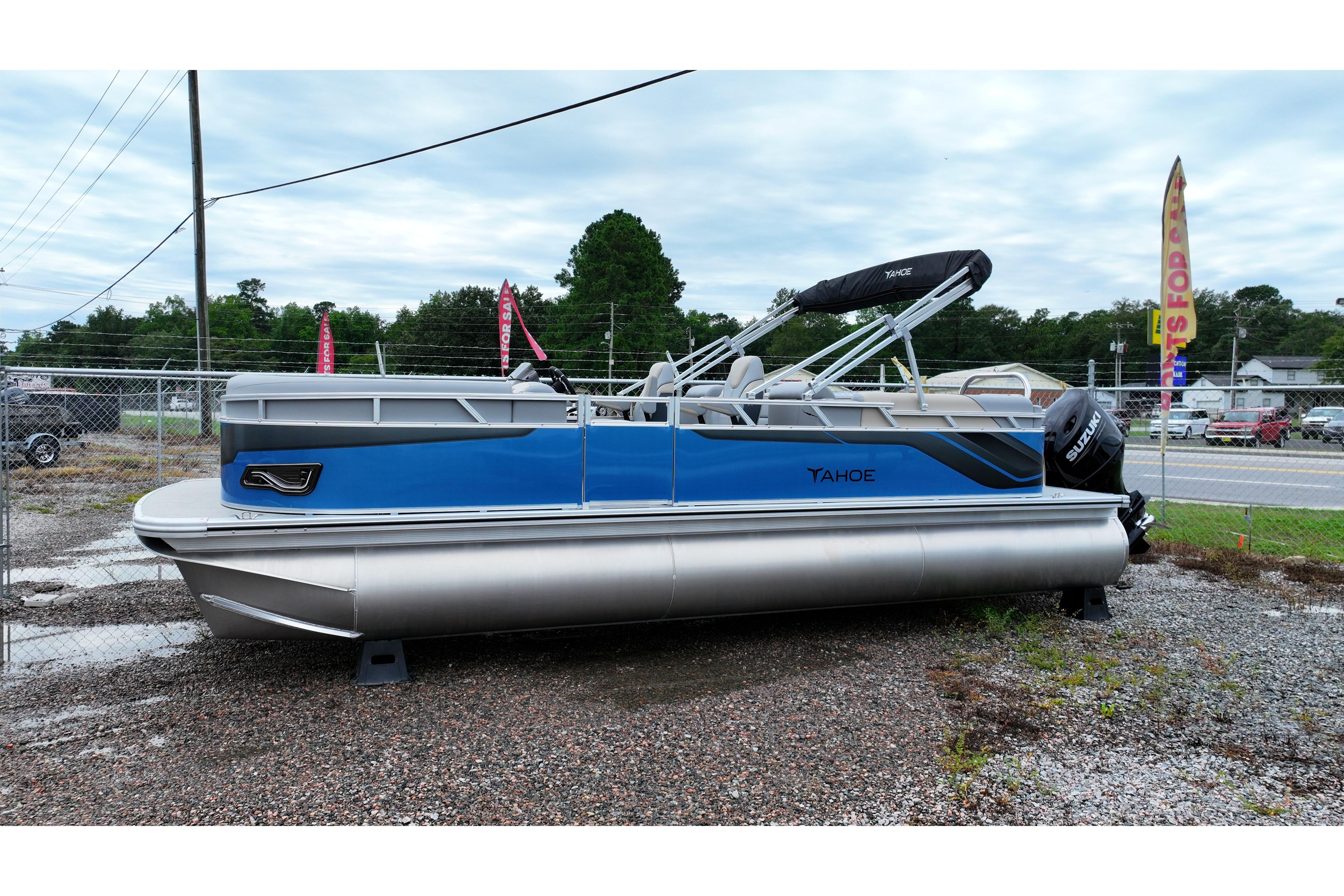 2026 Tahoe Pontoon Sport 85 Quad Lounger, blue and silver, parked outdoors.