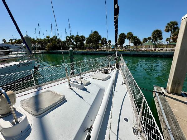 Concordia 52 sailboat docked in a marina, 1989 model, sunny day, clear water.