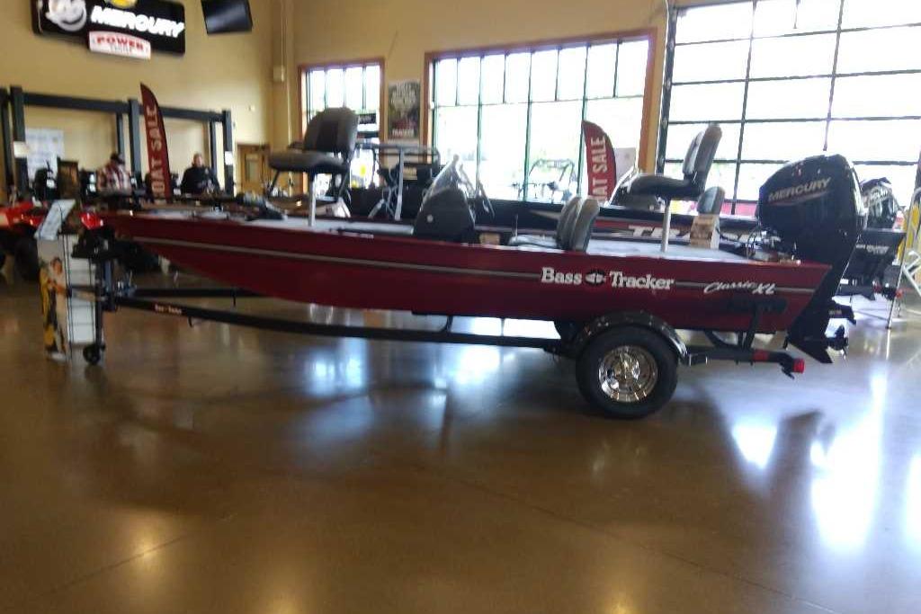 2026 Tracker Bass Tracker Classic XL boat displayed indoors on a trailer.