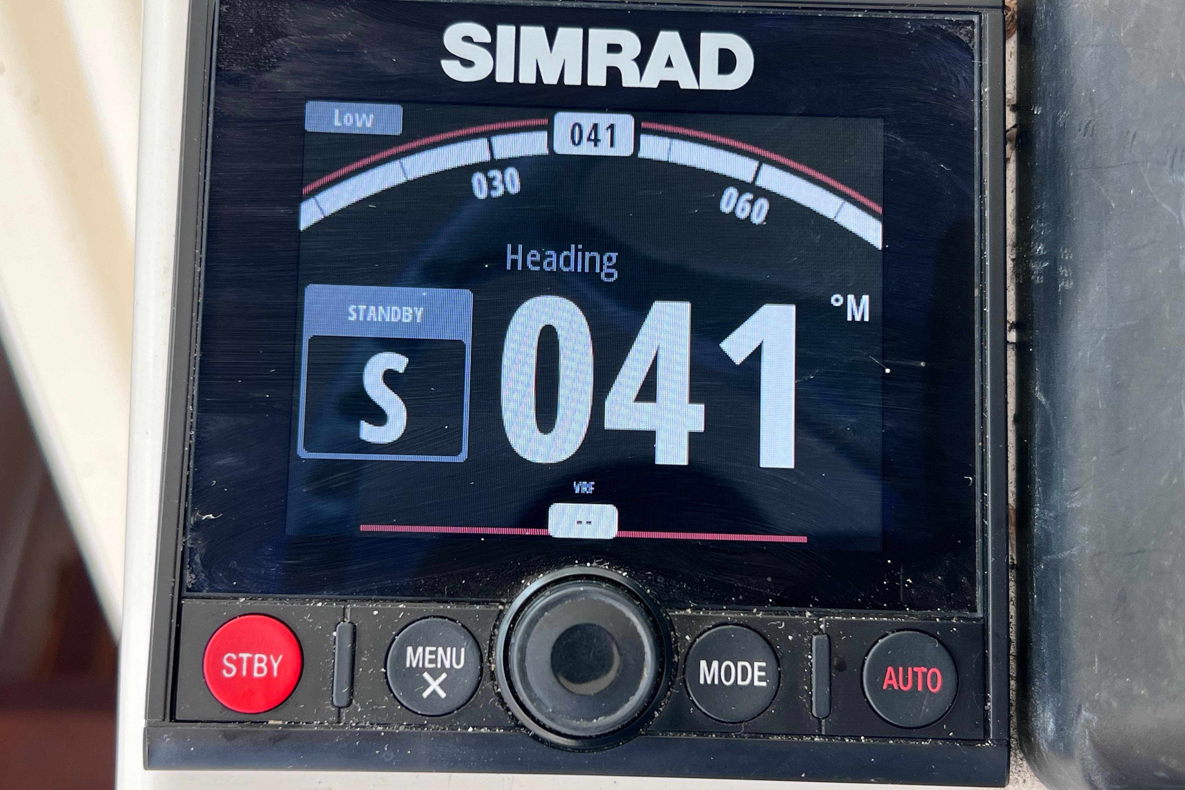 Simrad marine display showing heading 041° on a 2005 Pursuit 3070 Offshore boat.