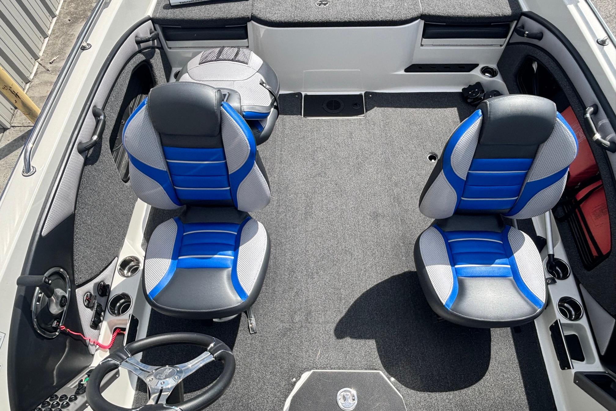 Interior of 2022 Ranger 1880MS boat with blue and gray seating.