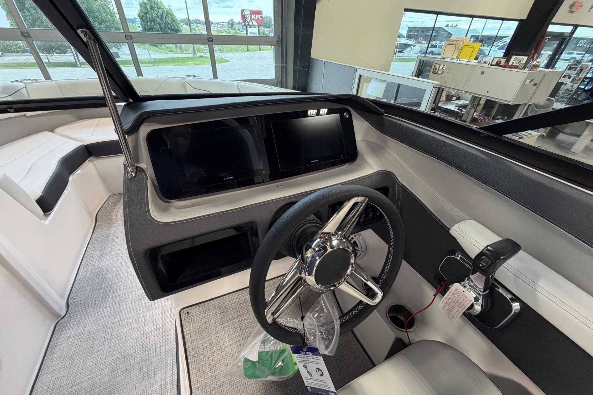 2027 Regal LS2 boat interior with modern dashboard and steering wheel.