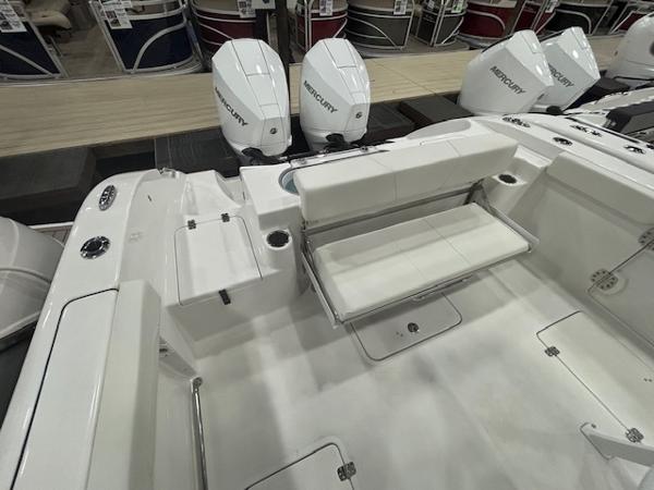 2025 Sea Pro 262 Offshore boat with Mercury engines, featuring a spacious seating area.