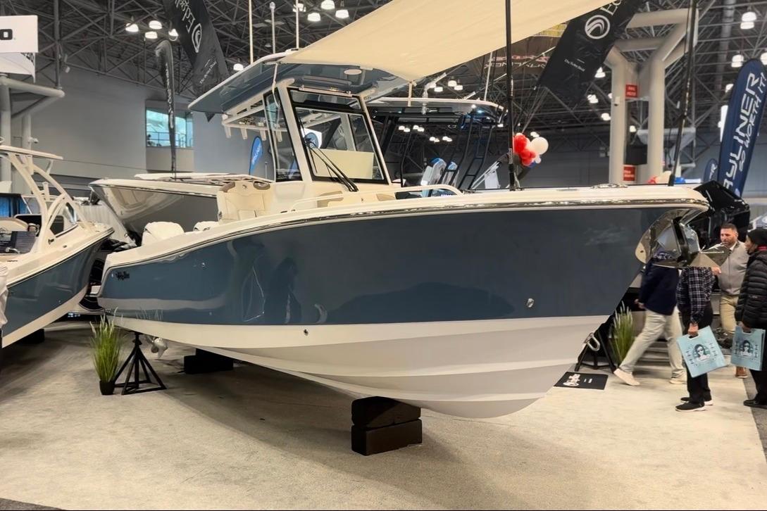 2026 Edgewater 250CC boat displayed at a show.