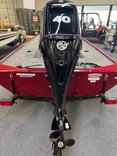 2025 Tracker Panfish 17 boat with Mercury 40 outboard motor, displayed indoors.