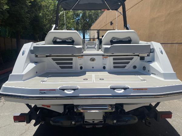 2025 Scarab 235 SE boat rear view, showcasing seating and deck design.