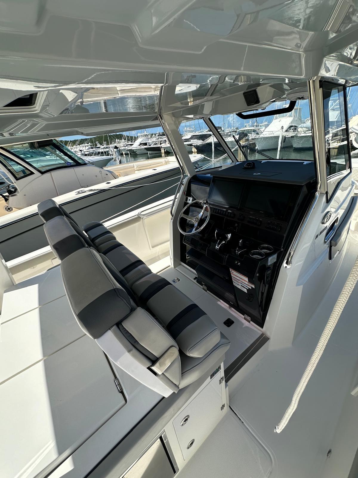 2023 Pursuit S 358 Sport boat interior with modern helm and seating.
