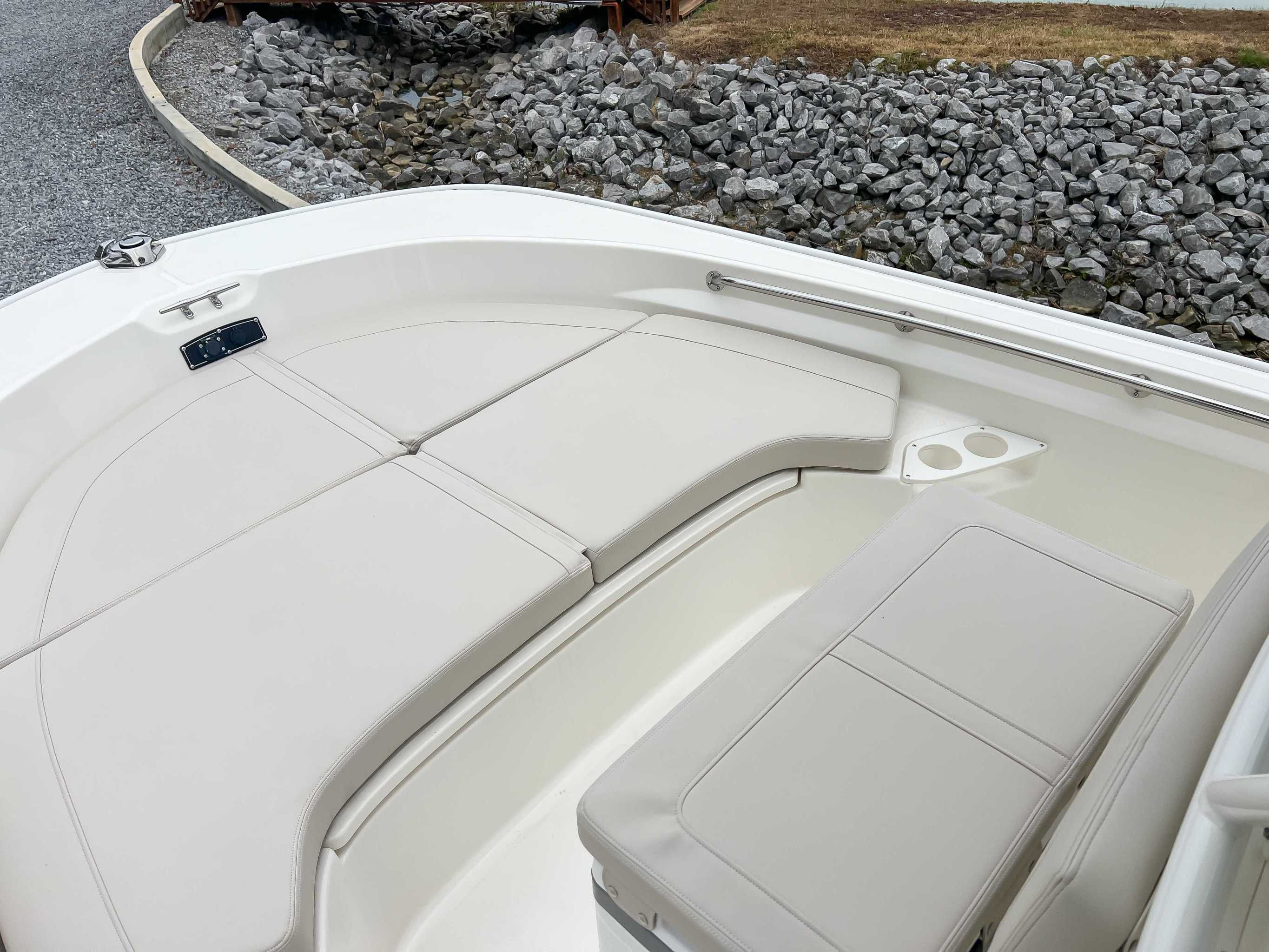 Interior of 2025 Boston Whaler 190 Montauk with beige upholstery.