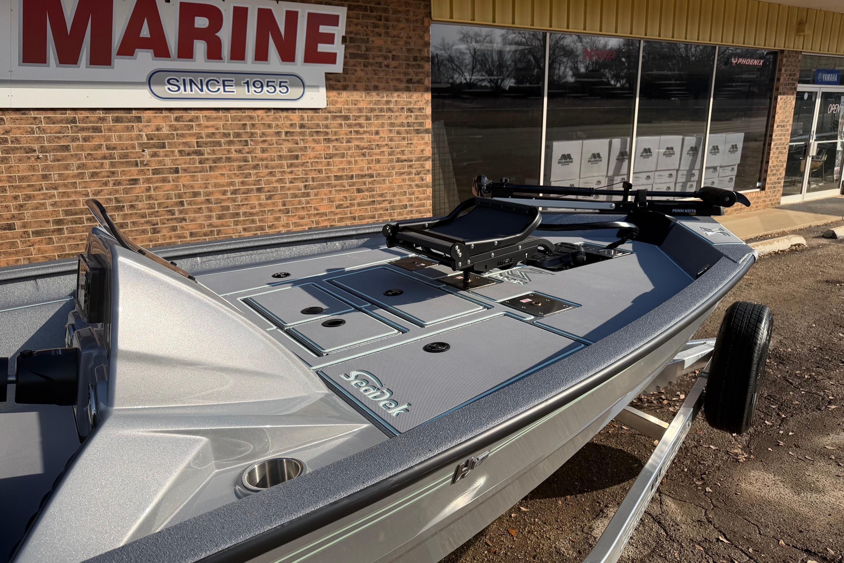 2026 Xpress H17C Crappie boat displayed outside a marine store.
