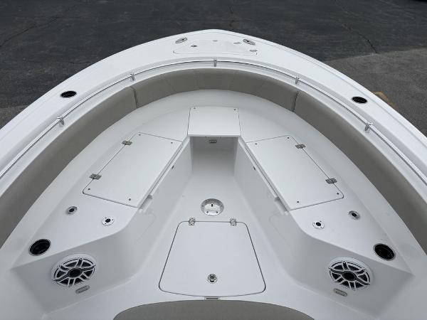 2025 Sportsman Open 232 boat interior, featuring spacious seating and storage compartments.