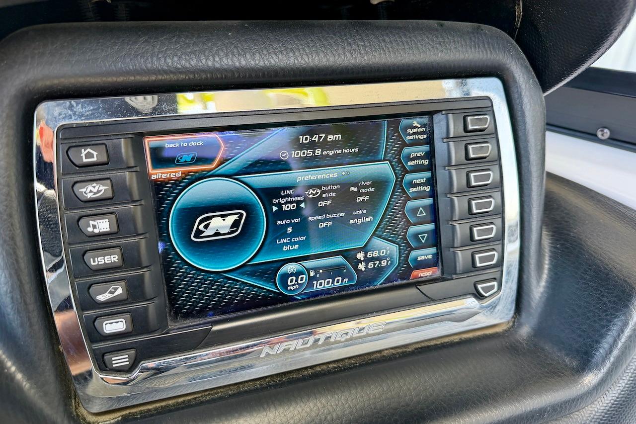 Touchscreen display of a 2014 Nautique Super Air Nautique G21 boat, showing control settings.