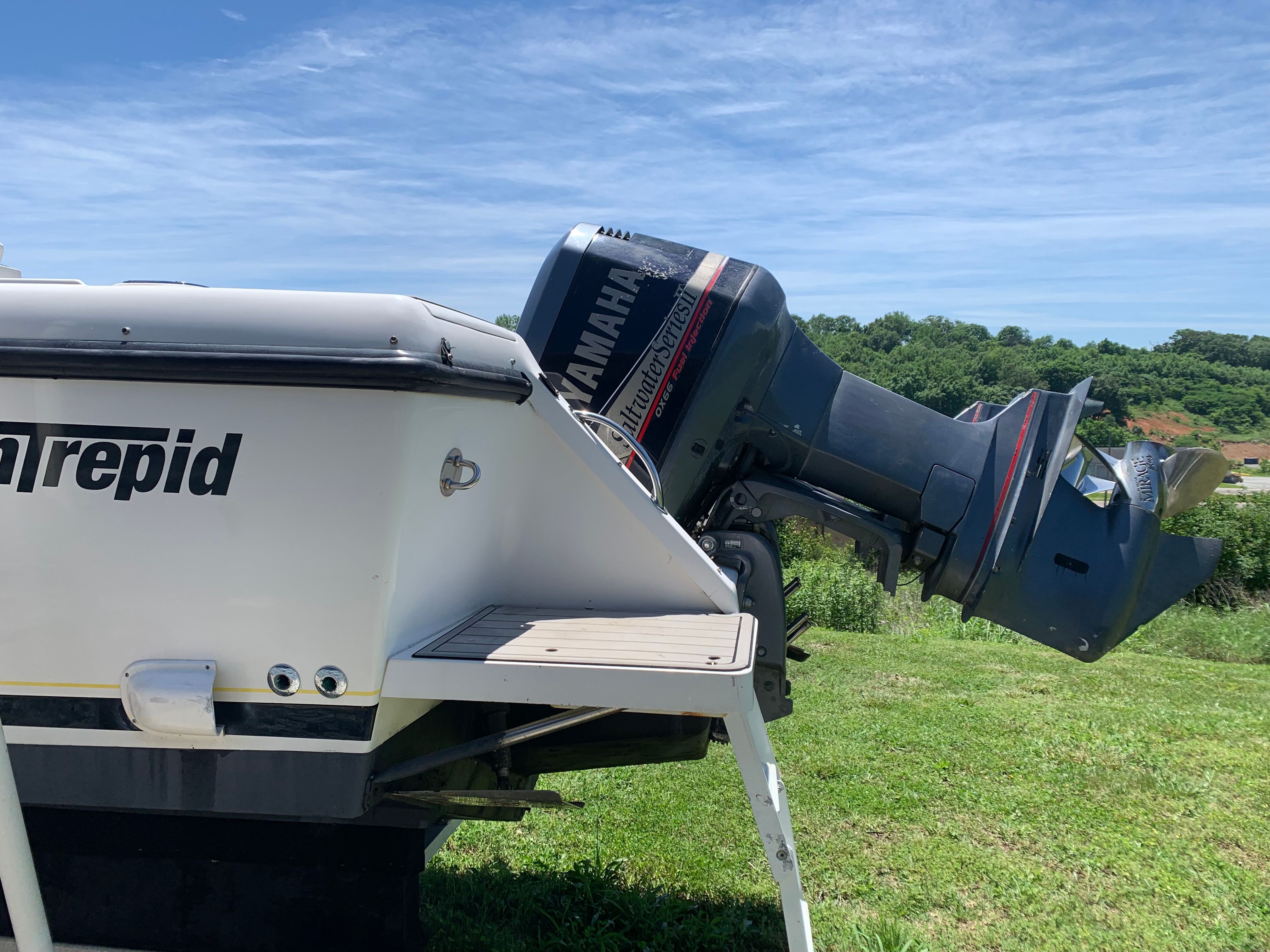 Intrepid 322 Cuddy Center Console boat with Yamaha engine, 2002 model.