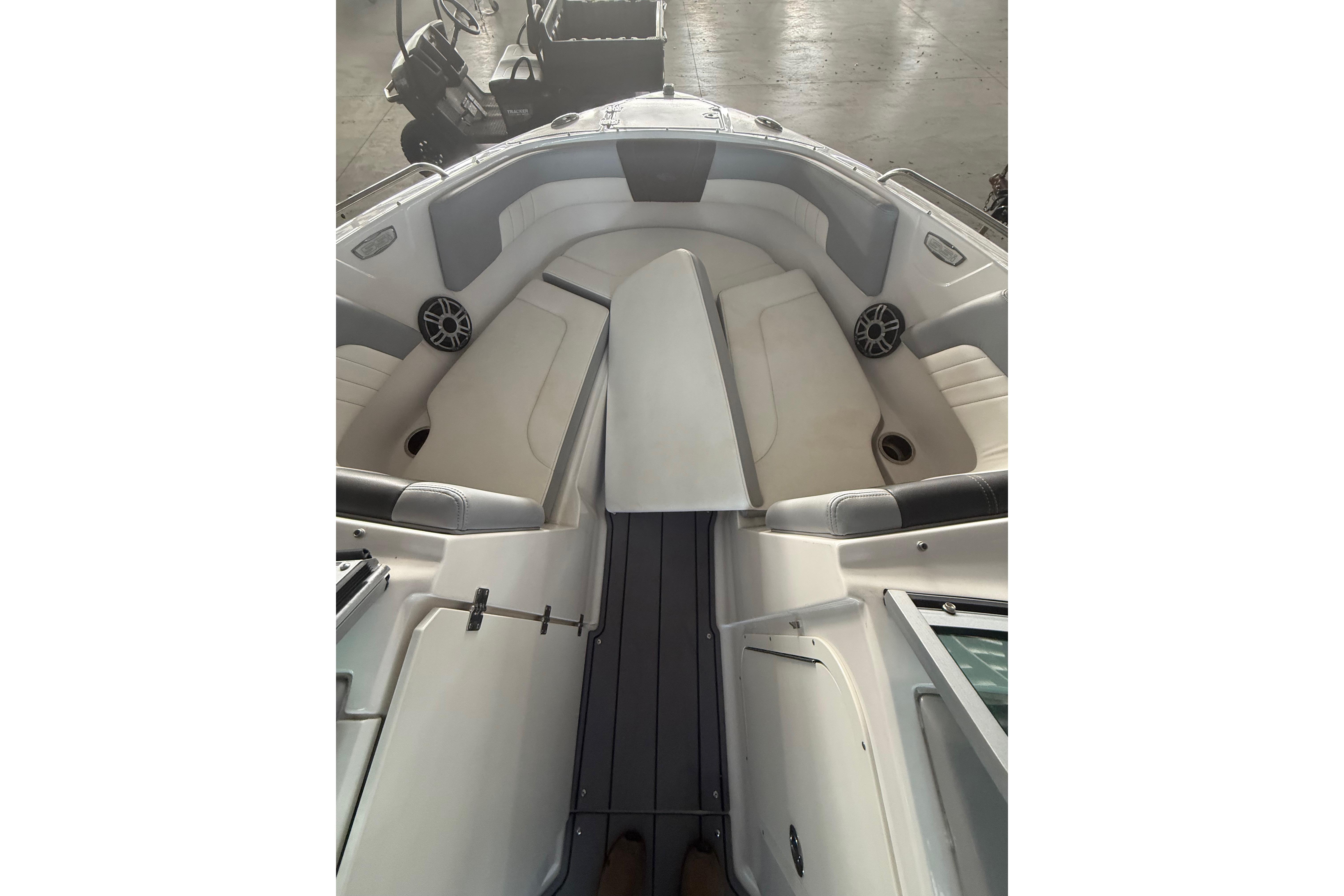 2023 Chaparral 230 SSi boat interior with seating and speakers.