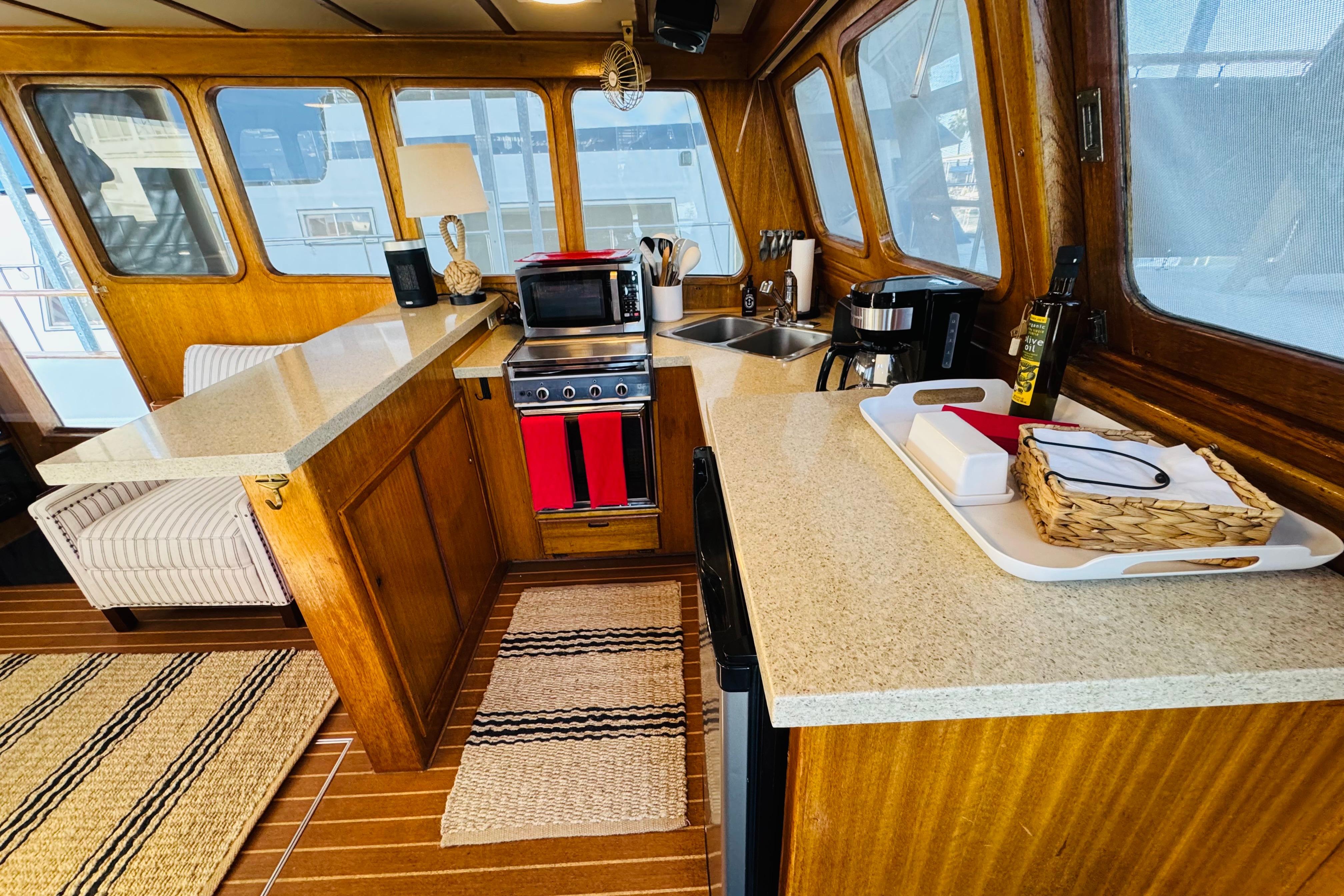 1978 Californian 42 LRC yacht interior with wooden cabinetry and modern kitchen amenities.