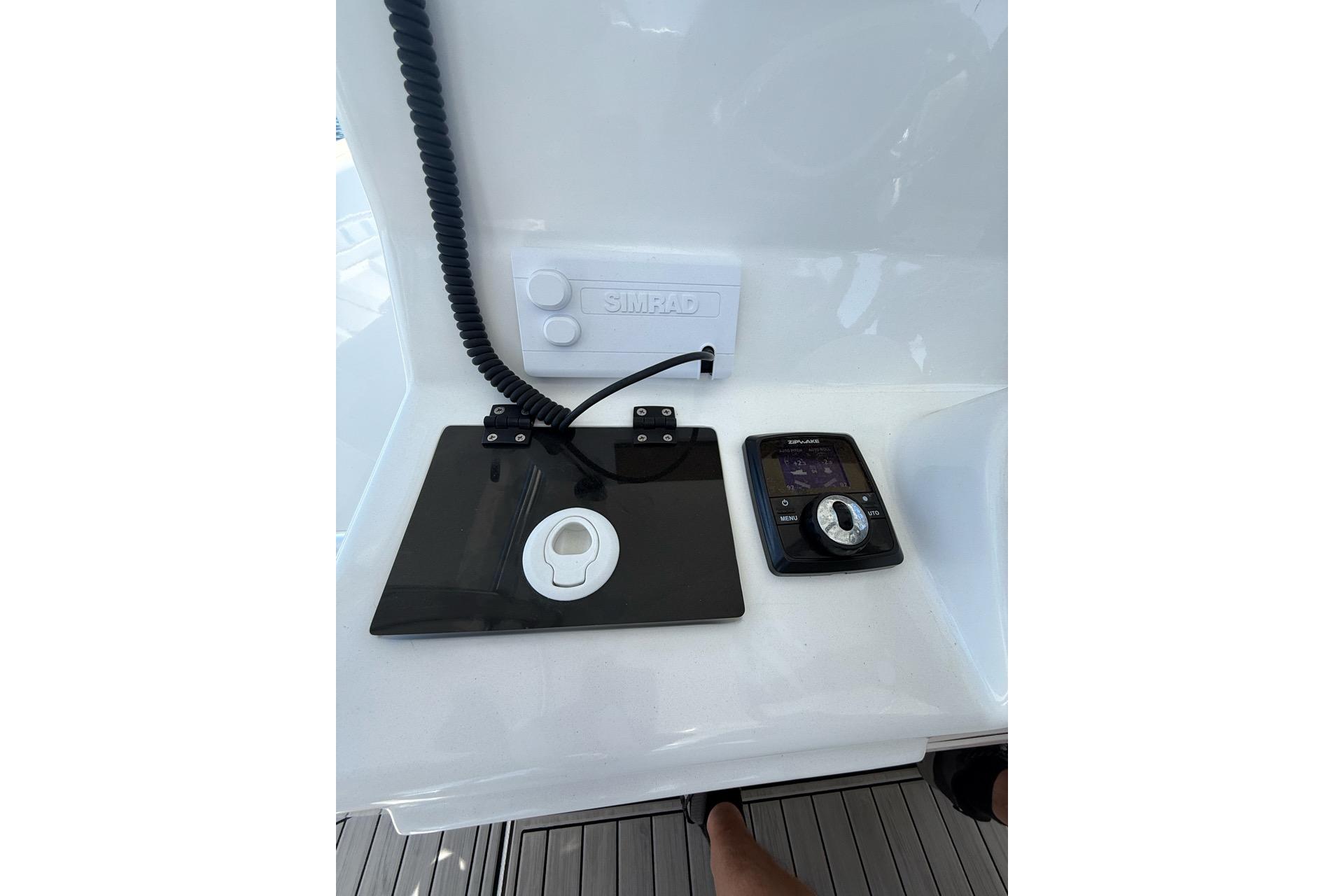 Control panel of 2021 Custom Infusion 34 CC boat with Simrad electronics.