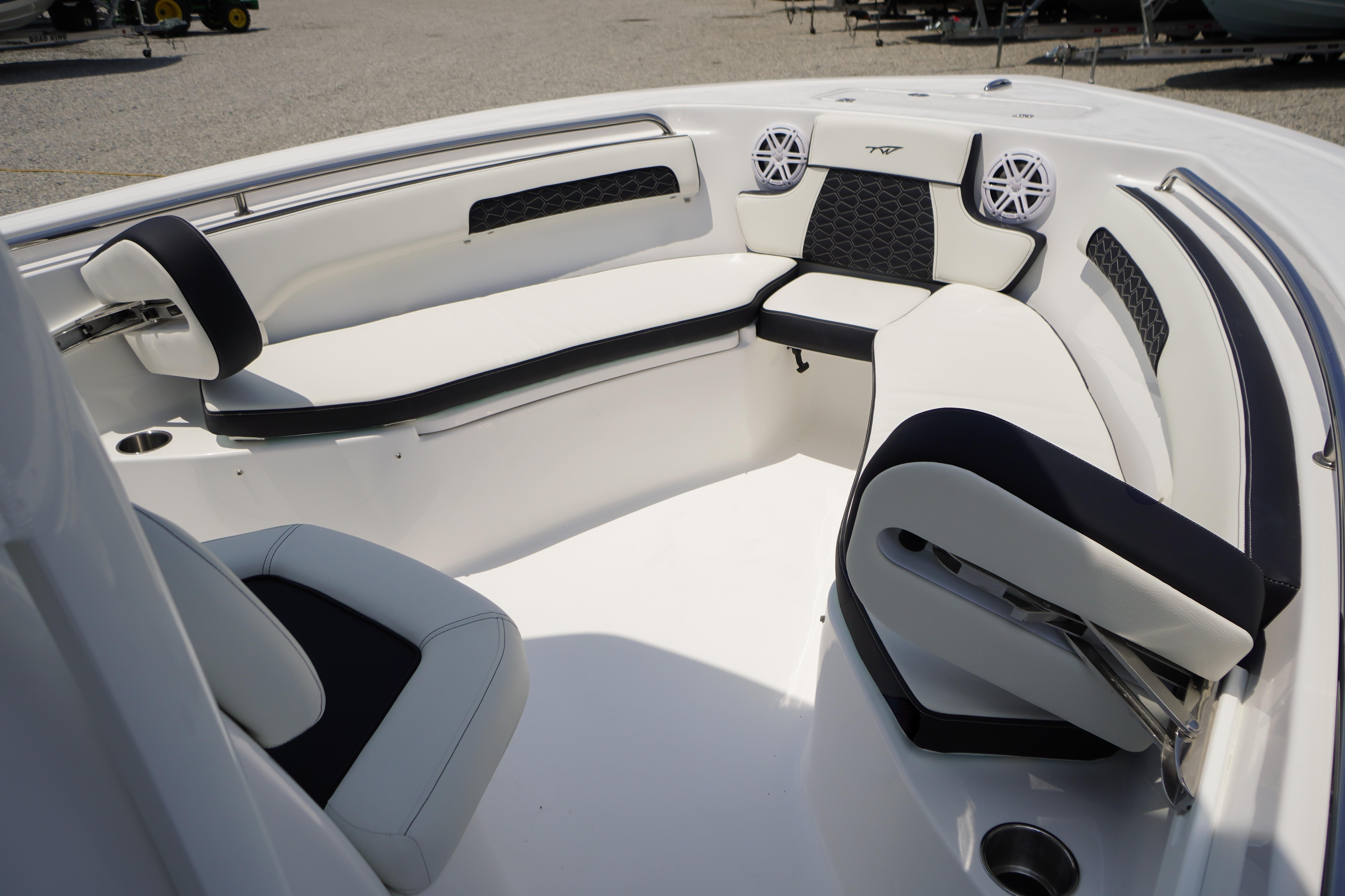 2027 Tidewater 220 CC Adventure boat interior with cushioned seating and modern design.