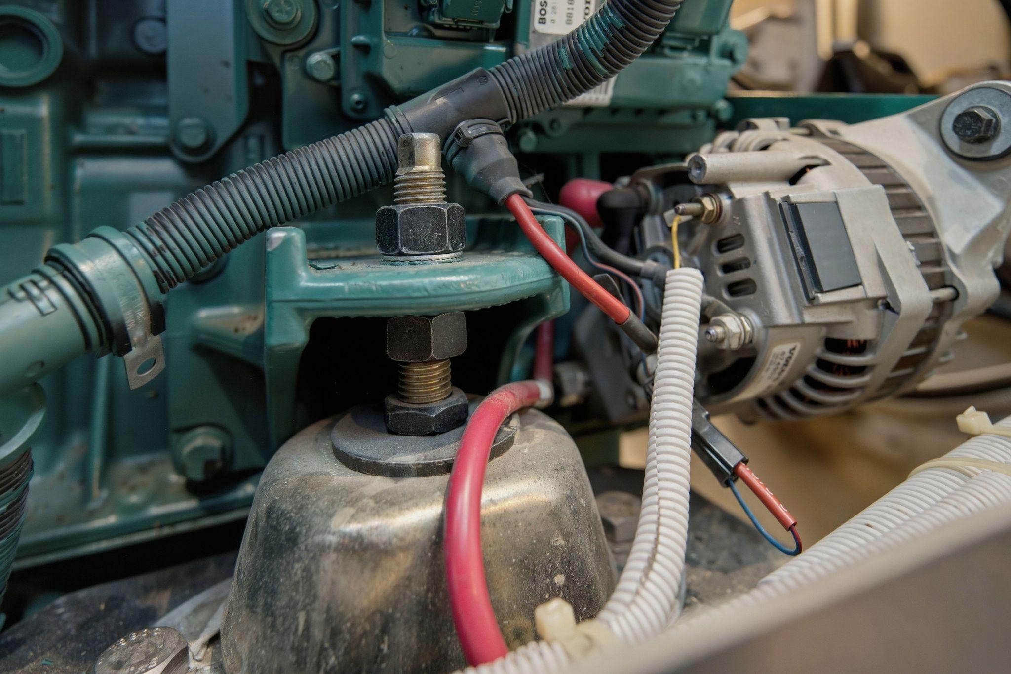 Engine components of a 2005 Carver 39 Motor Yacht, featuring wiring and mechanical parts.