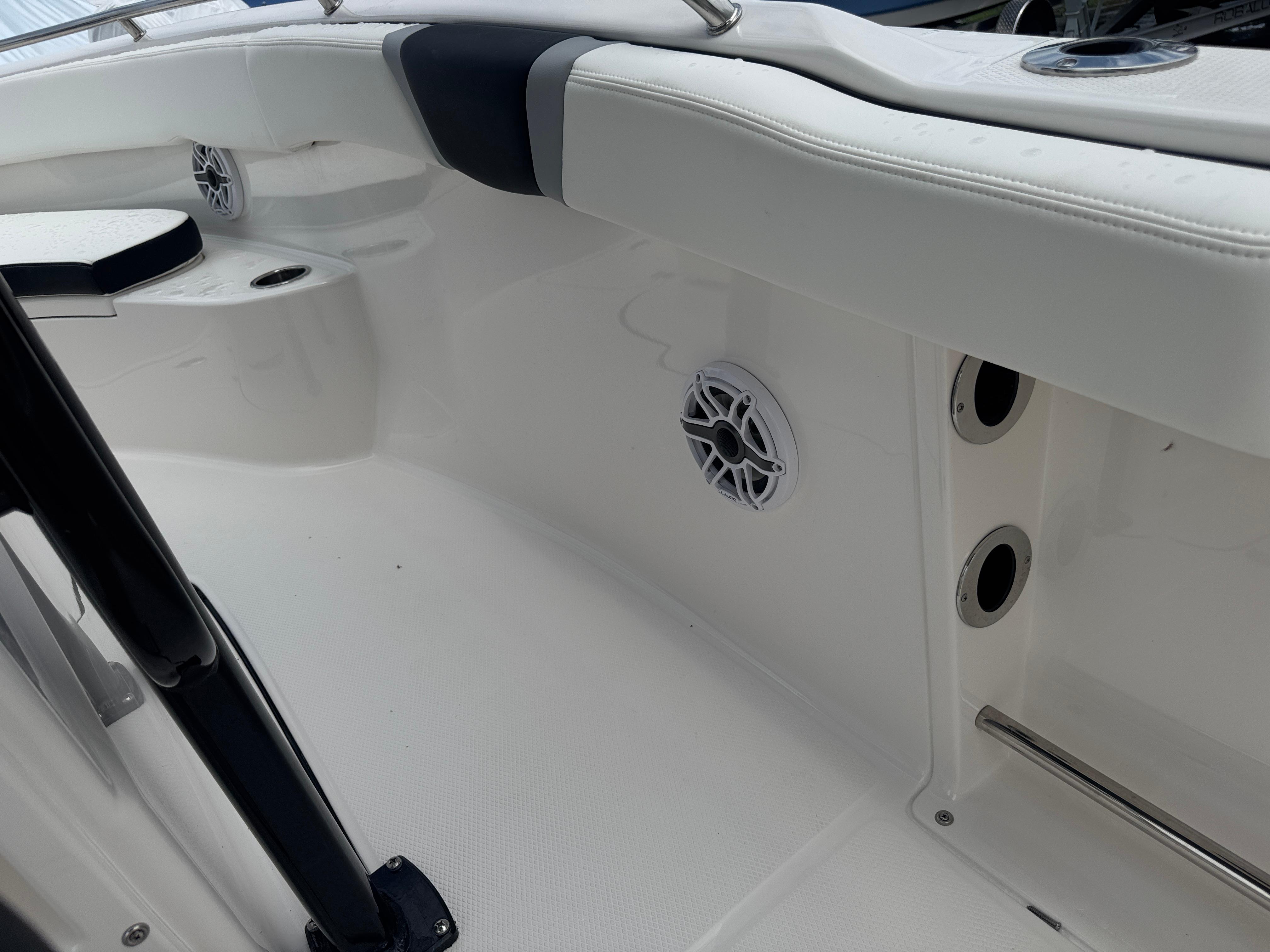 2025 Robalo R222 Center Console boat interior with speaker and seating detail.