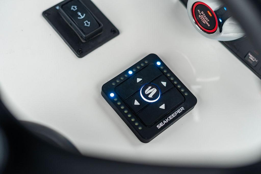Control panel of a 2027 Reef Runner 280 boat featuring Seakeeper technology.