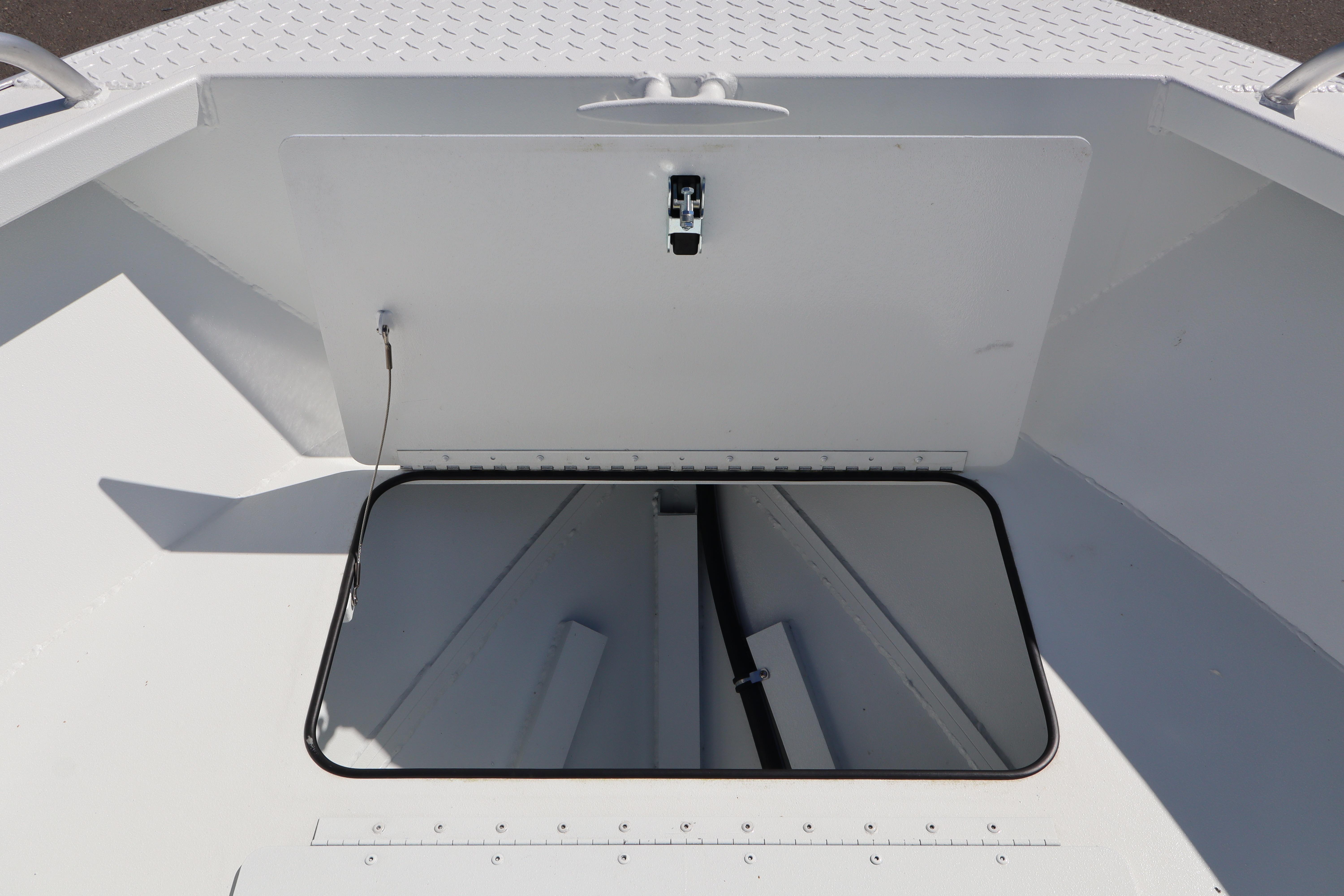 2026 Alumaweld Stryker 202 boat storage compartment with open hatch, showcasing interior space.