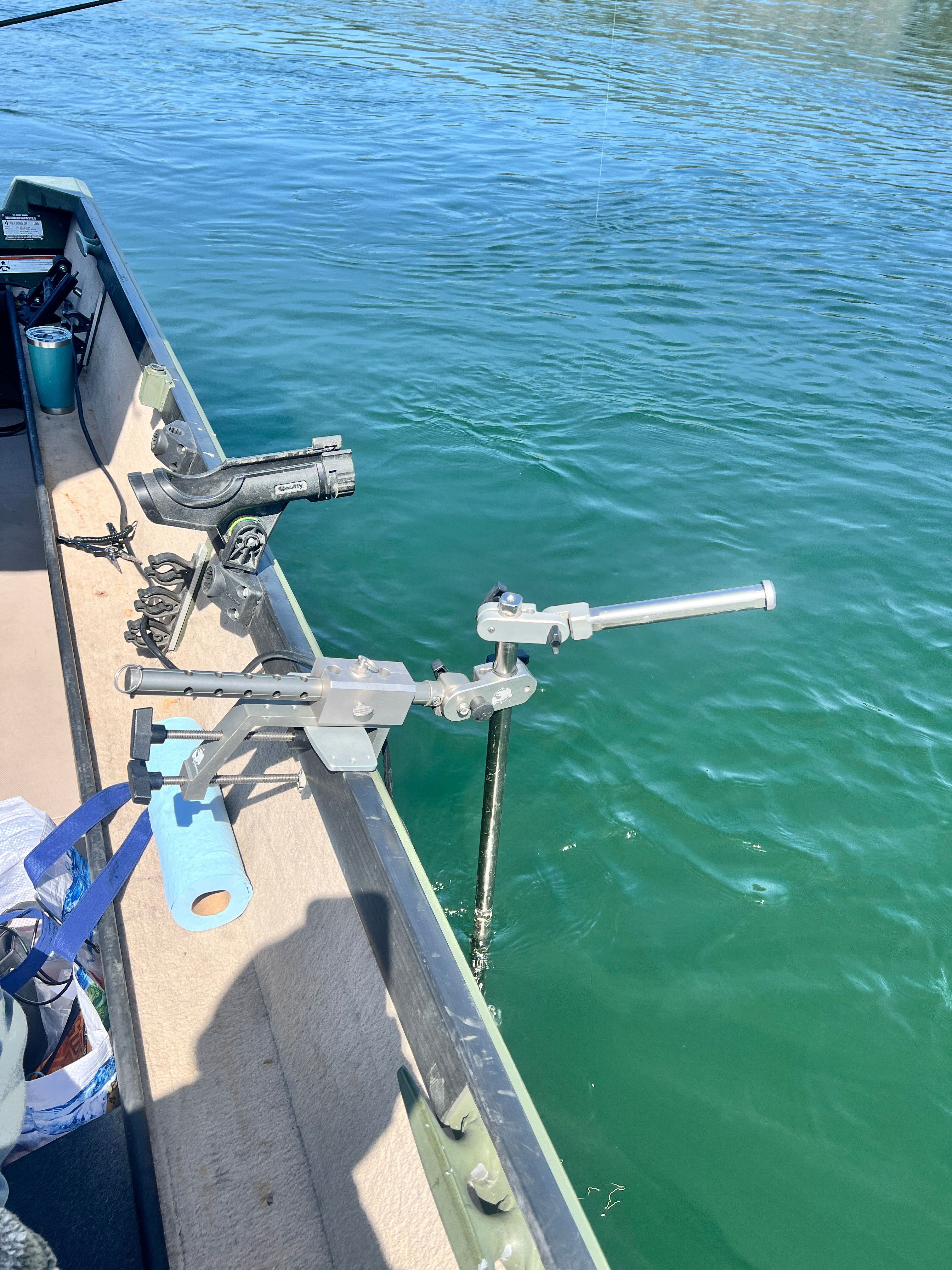 2002 Alumaweld Super Vee fishing boat with rod holders.