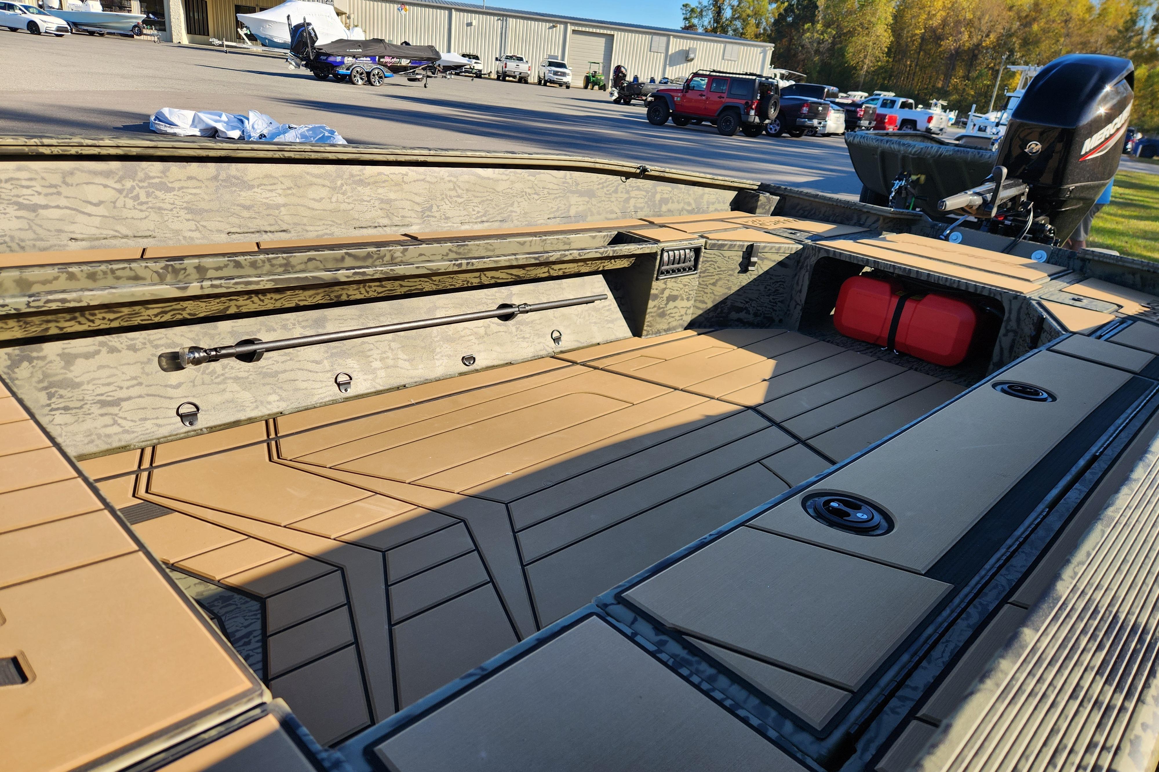 2026 Tracker Grizzly 1756 T Marsh boat interior with spacious deck and storage compartments.