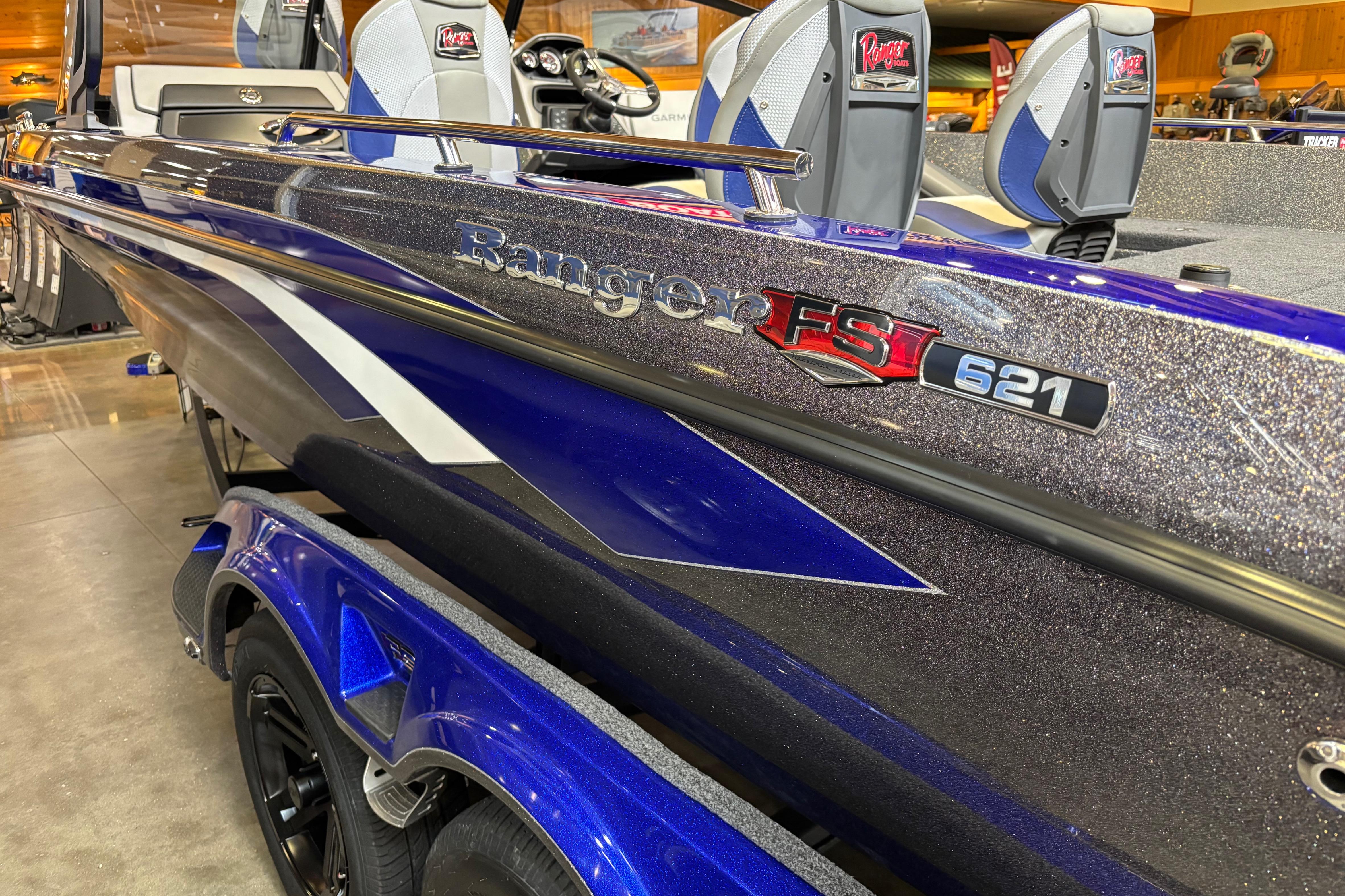2026 Ranger 621FS Cup-Equipped boat, blue with sleek design and logo detailing.