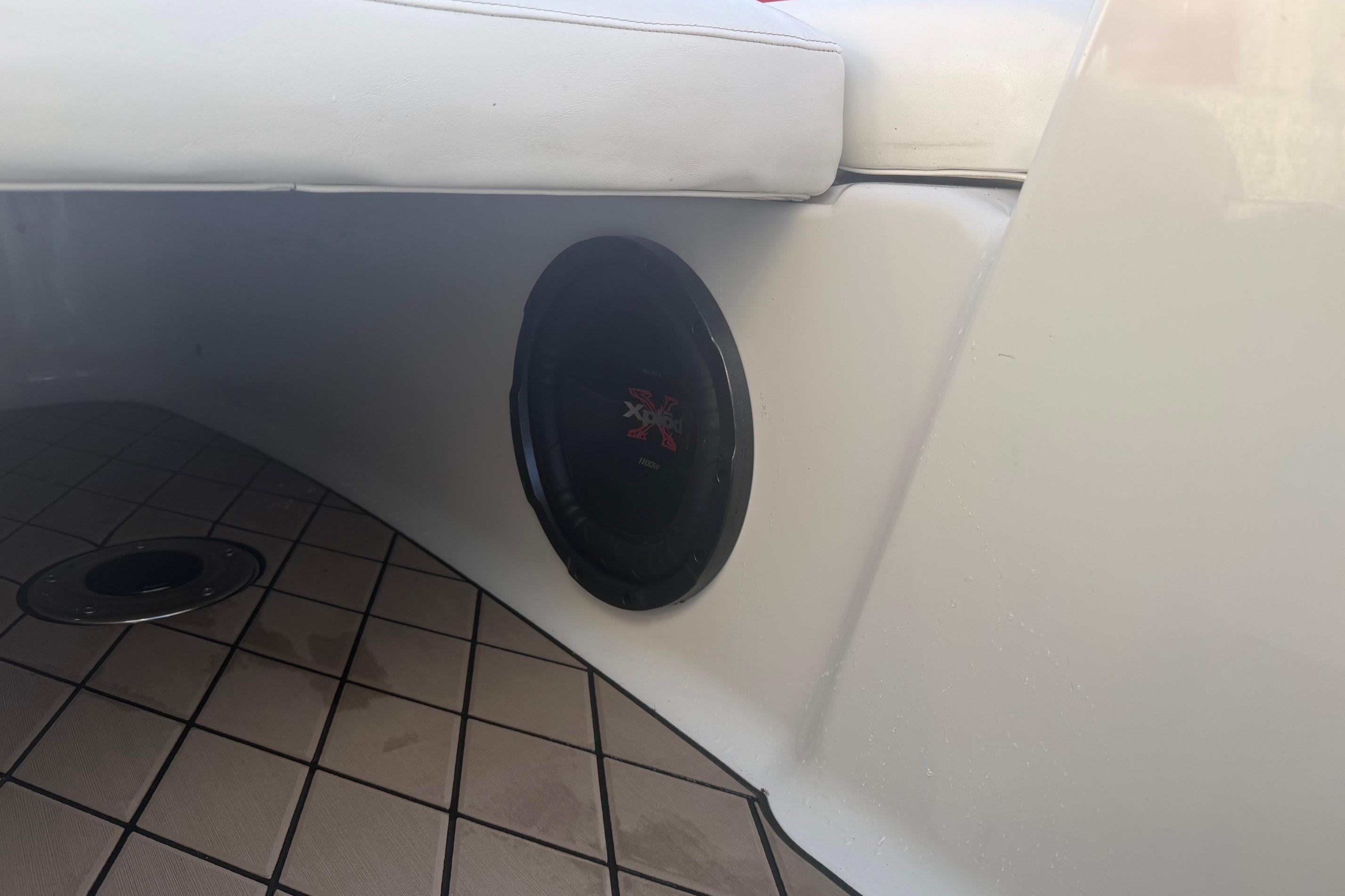 Speaker installed on a 2005 Crownline 270 BR boat, featuring a tiled floor.